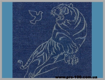 Гравировка джинса на лазере.